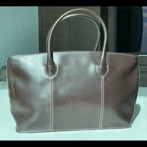 Furla Brown Leather top handles handbag with protective storage bag.